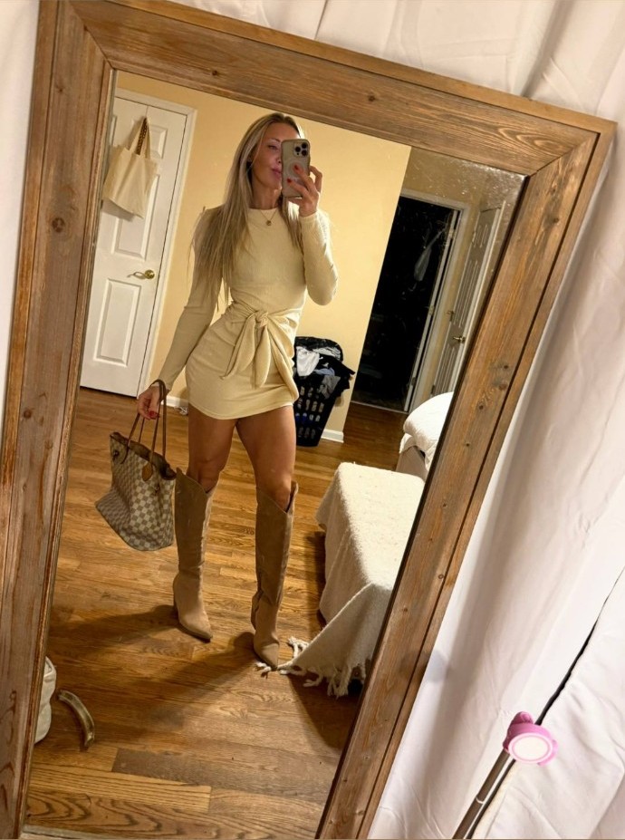 Bee in a cream outfit and boots